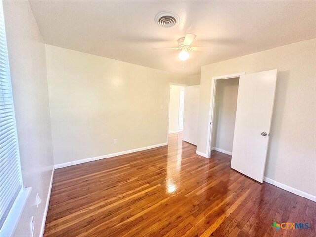 909 S 23rd St, Copperas Cove, TX 76522 - spare room featuring wood finished floors, baseboards, and a ceiling fan