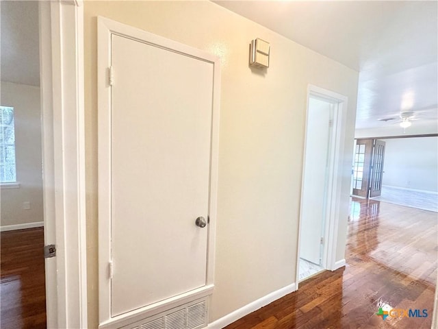 909 S 23rd St, Copperas Cove, TX 76522 - hallway featuring wood finished floors and baseboards