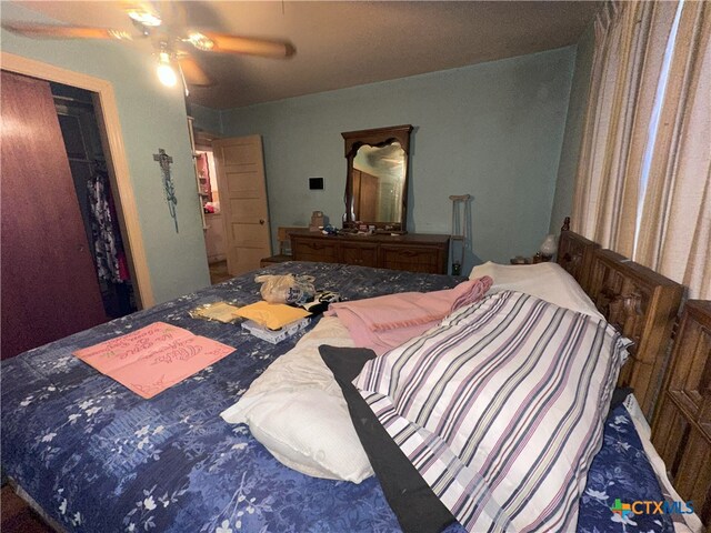 bedroom featuring ceiling fan