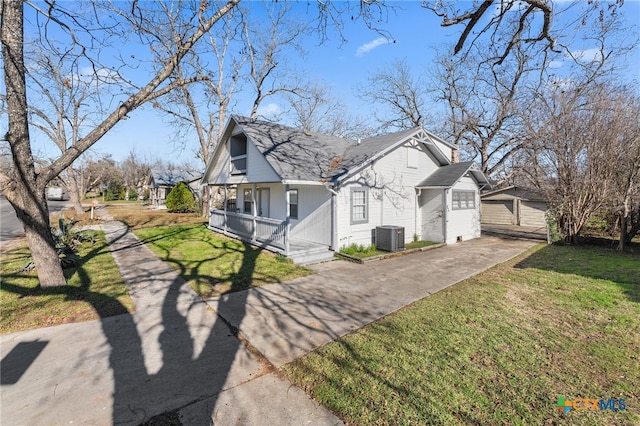 exterior space with central AC unit, a porch, and a lawn