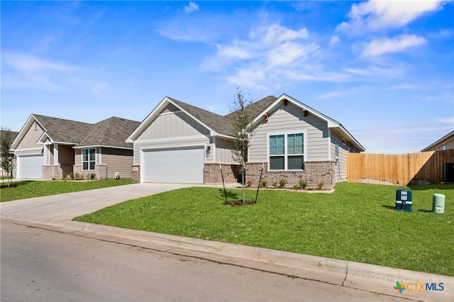 craftsman-style house with a front yard and a garage