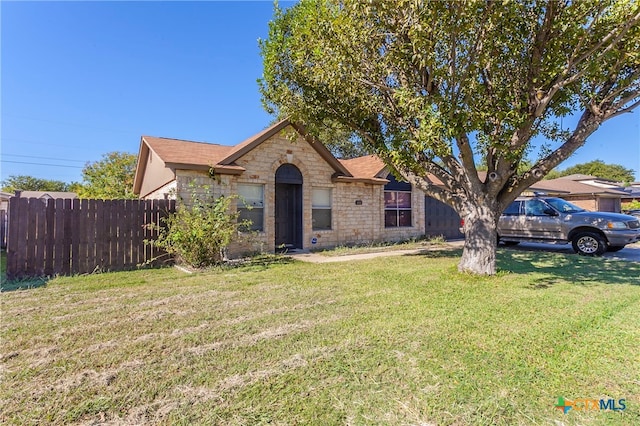 view of front of property with a front yard