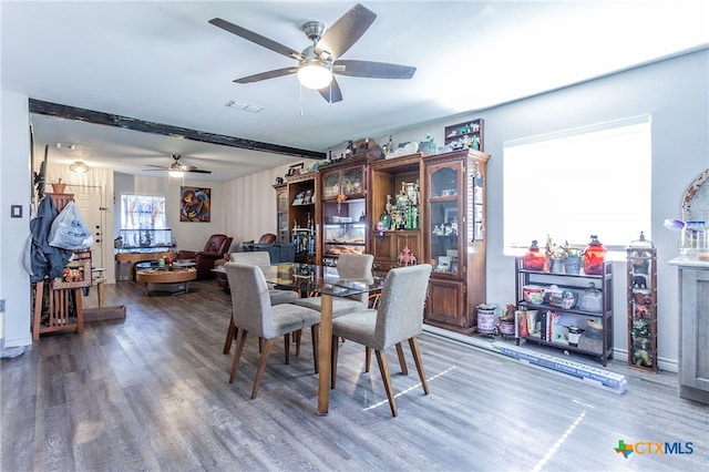 dining space featuring hardwood / wood-style flooring and ceiling fan