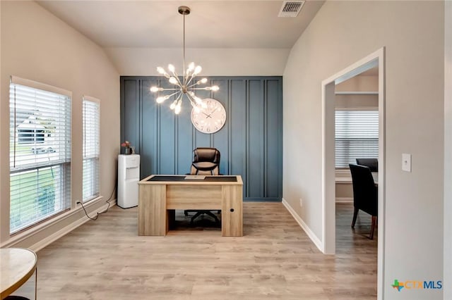 213 Flint Rock Ct, Victoria, TX 77904 - home office featuring a chandelier and light wood finished floors