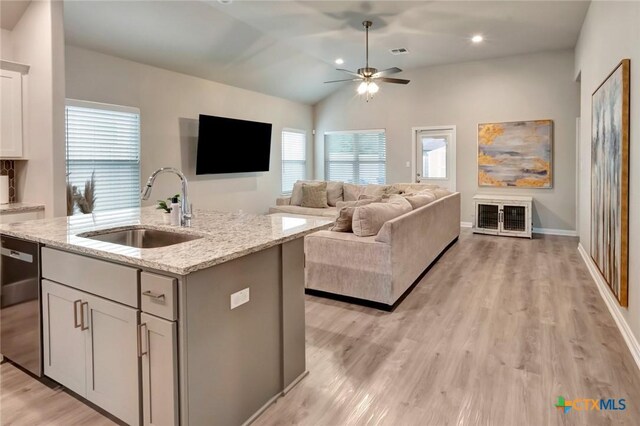 213 Flint Rock Ct, Victoria, TX 77904 - kitchen featuring dishwasher, open floor plan, light wood-type flooring, ceiling fan, and lofted ceiling