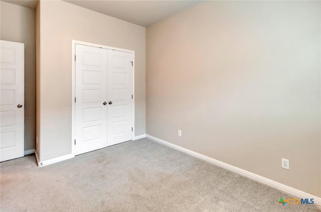 213 Flint Rock Ct, Victoria, TX 77904 - unfurnished bedroom with carpet floors and a closet