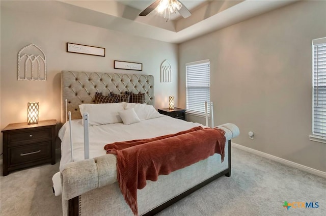213 Flint Rock Ct, Victoria, TX 77904 - bedroom featuring light carpet, multiple windows, and ceiling fan