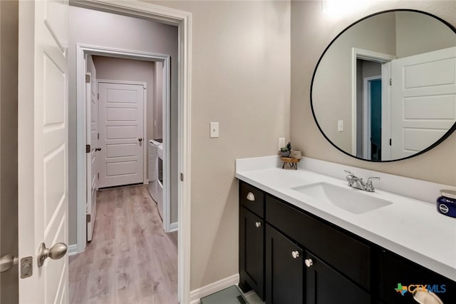 213 Flint Rock Ct, Victoria, TX 77904 - bathroom with vanity and wood finished floors
