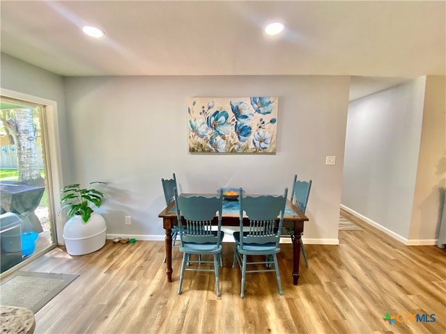 dining space featuring light hardwood / wood-style flooring