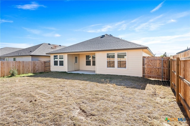 rear view of property featuring a patio