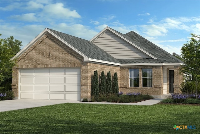 view of front of property with a front lawn and a garage