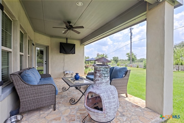 view of patio with ceiling fan