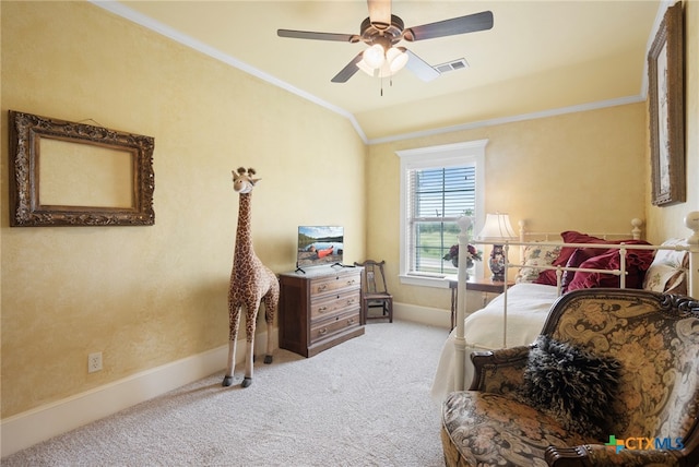 bedroom with carpet flooring, lofted ceiling, ceiling fan, and crown molding