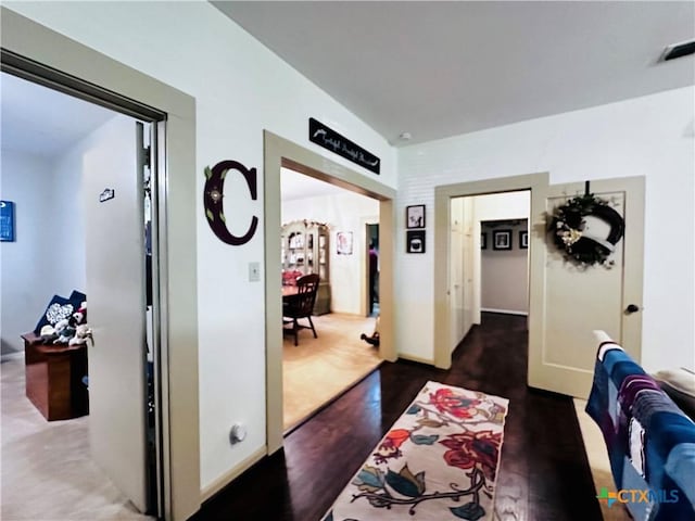 205 Coke St, Yoakum, TX 77995 - corridor featuring wood finished floors