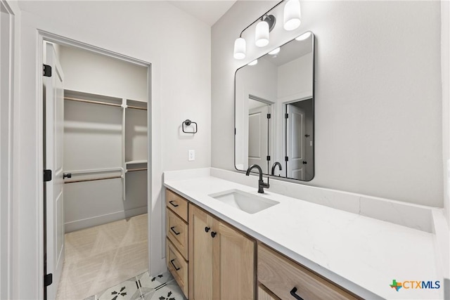 227 Glenview Cir, Belton, TX 76513 - bathroom with vanity, tile patterned floors, and a spacious closet