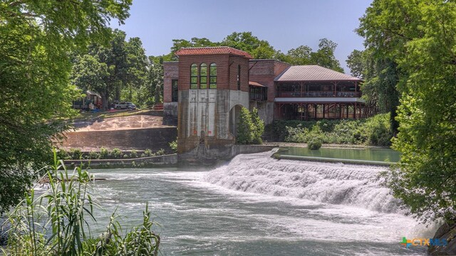 1002 Indian Way, Seguin, TX 78155 - surrounding community with a water view