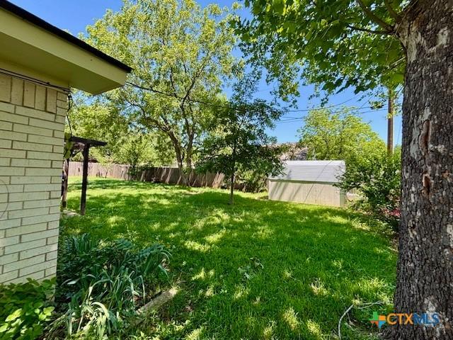 119 Gateway Cir, Gatesville, TX 76528 - view of yard with a fenced backyard