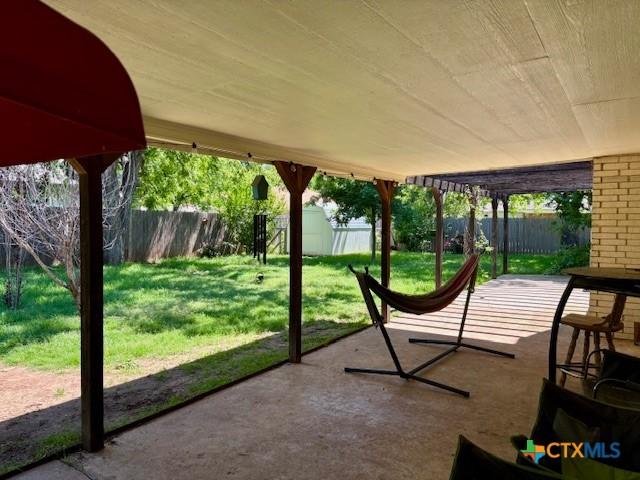 119 Gateway Cir, Gatesville, TX 76528 - view of patio with a fenced backyard