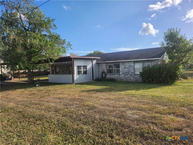 exterior space featuring a yard