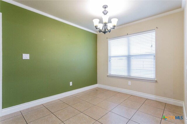 unfurnished room with crown molding, a chandelier, baseboards, and light tile patterned floors
