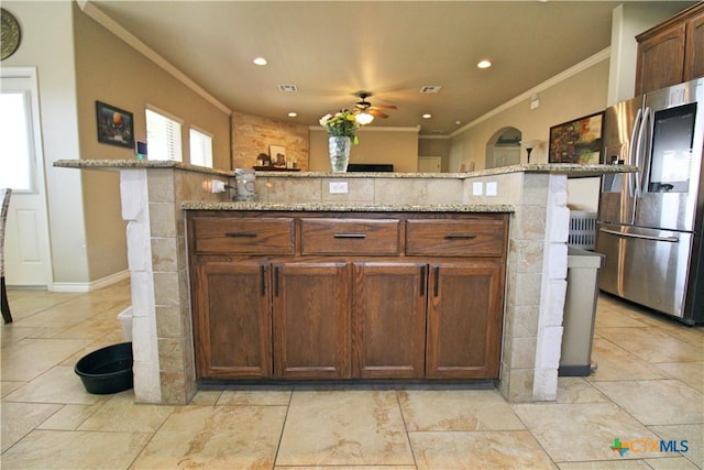 6704 Deorsam Loop, Killeen, TX 76542 - kitchen featuring stainless steel refrigerator with ice dispenser, ornamental molding, a ceiling fan, light stone counters, and recessed lighting