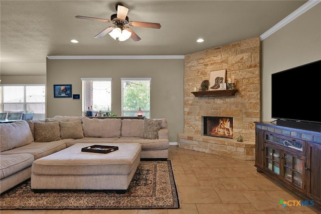 6704 Deorsam Loop, Killeen, TX 76542 - living room featuring ornamental molding, plenty of natural light, a stone fireplace, ceiling fan, and recessed lighting