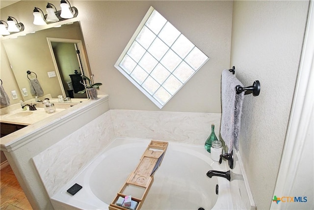 6704 Deorsam Loop, Killeen, TX 76542 - bathroom with a garden tub and vanity