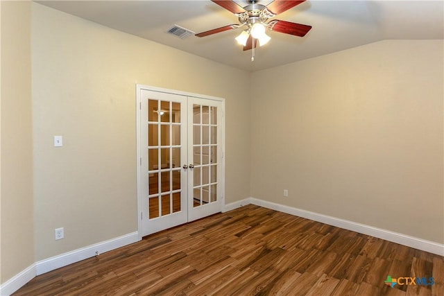 unfurnished room with ceiling fan, french doors, dark wood-type flooring, and vaulted ceiling