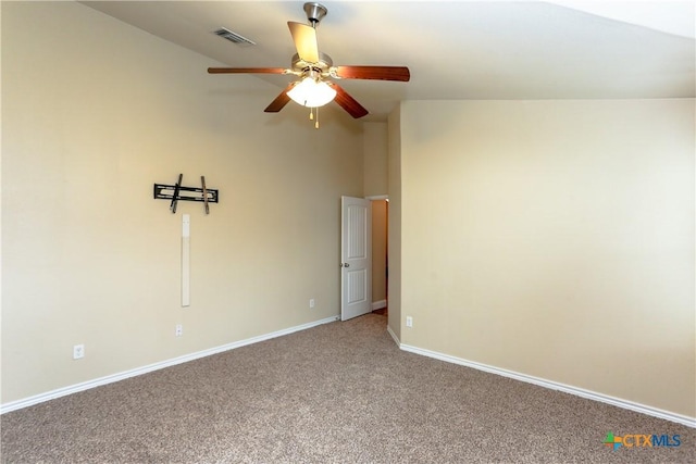 carpeted empty room with ceiling fan