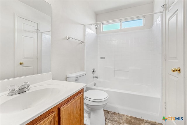 full bathroom with shower / tub combination, vanity, and toilet