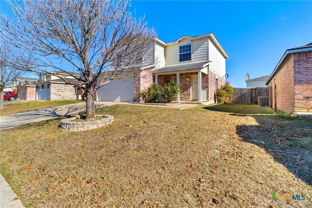 view of front of property with a front yard and central AC