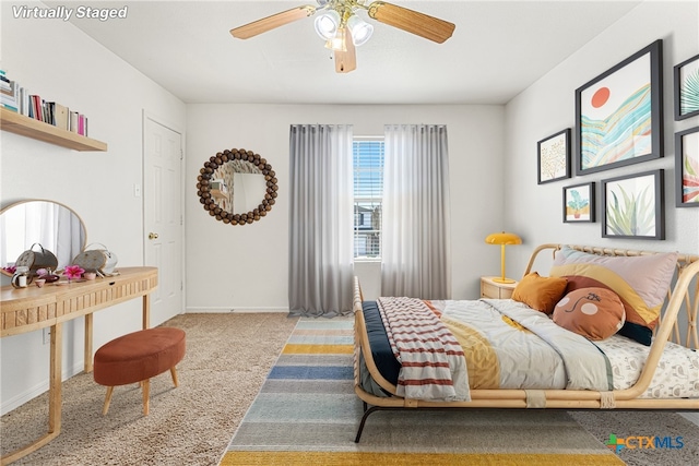 bedroom featuring carpet flooring and ceiling fan