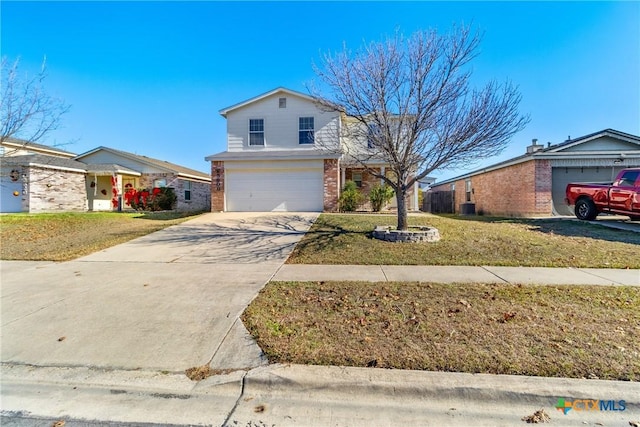 view of front of house featuring a front yard and a garage