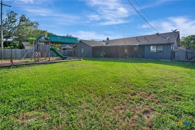 1407 Plantation Rd, Victoria, TX 77904 - view of yard with a playground
