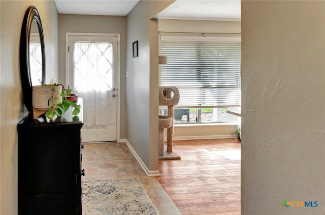 1407 Plantation Rd, Victoria, TX 77904 - foyer entrance featuring baseboards and stone finish floors