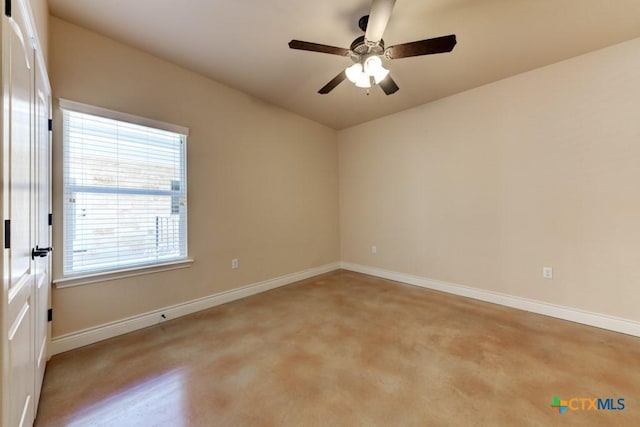 empty room with baseboards and ceiling fan