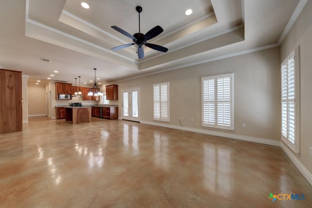 unfurnished living room featuring baseboards, a raised ceiling, concrete flooring, and ceiling fan with notable chandelier