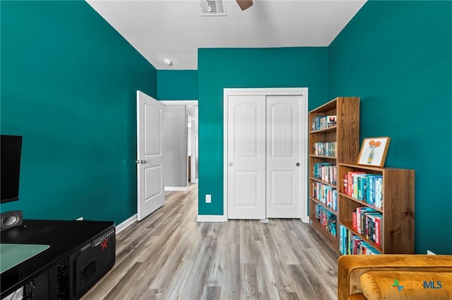 211 W Vega Ln, Killeen, TX 76542 - bedroom with wood finished floors, a closet, baseboards, and ceiling fan