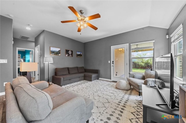 211 W Vega Ln, Killeen, TX 76542 - living room with a ceiling fan, vaulted ceiling, baseboards, and carpet