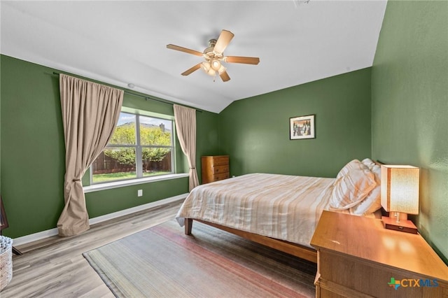 211 W Vega Ln, Killeen, TX 76542 - bedroom featuring wood finished floors, baseboards, vaulted ceiling, and a ceiling fan