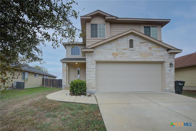 525 Tom Kemp Dr, New Braunfels, TX 78130 - traditional-style home with fence, central AC, concrete driveway, stone siding, and a garage