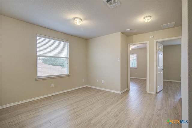 525 Tom Kemp Dr, New Braunfels, TX 78130 - empty room with light wood-style floors and baseboards