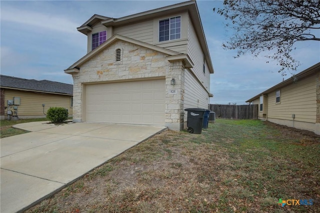 view of home's exterior with a yard and central AC unit