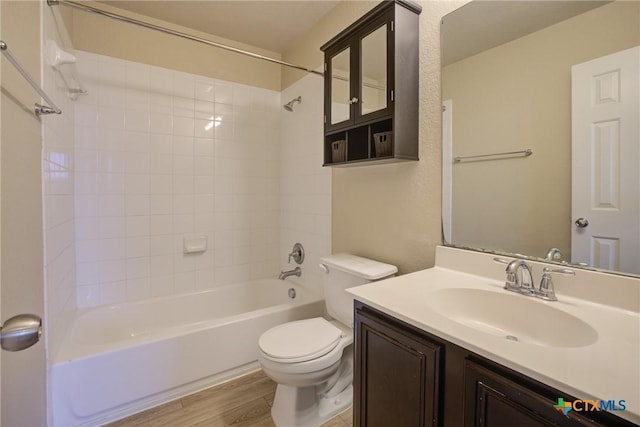 525 Tom Kemp Dr, New Braunfels, TX 78130 - bathroom featuring bathtub / shower combination, vanity, and wood finished floors