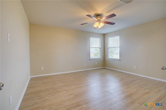 525 Tom Kemp Dr, New Braunfels, TX 78130 - empty room with ceiling fan and light wood finished floors