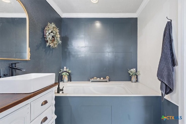 bathroom featuring vanity and crown molding