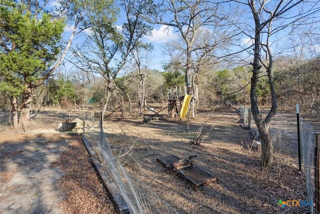 view of yard featuring a playground