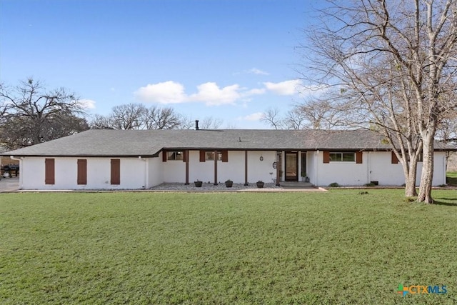 view of front of home with a front lawn