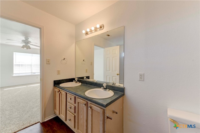 bathroom with vanity and ceiling fan