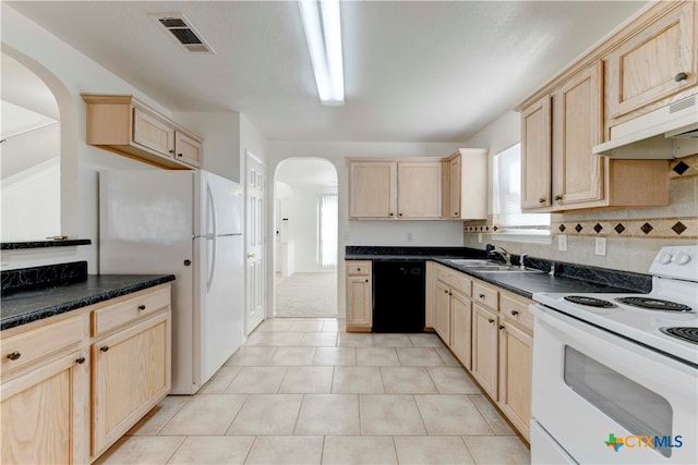 kitchen featuring light brown cabinets, white appliances, sink, and premium range hood